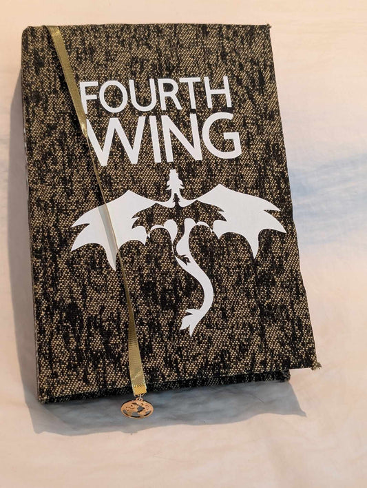 The Booktok Book sensation Fourth Wing rebound with book binding with custom covers. Made with Leather and Vinyl right here in Canada!
